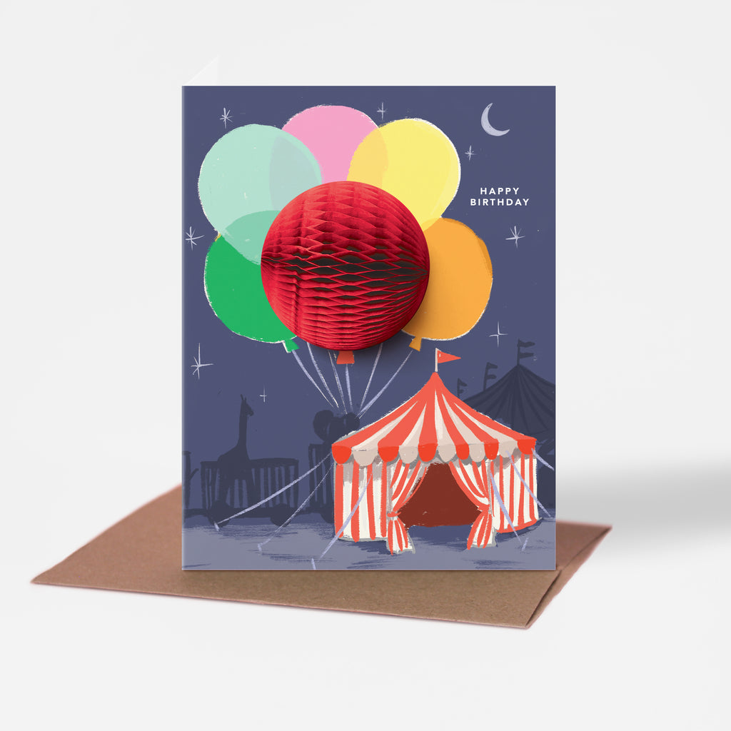 Big Top circus-themed pop-up birthday card with honeycomb balloon and a "Happy Birthday" message on the front
